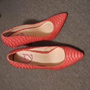 Pink heels. Size 5.5. Like new. Worn only a few times. Smoke-free home.